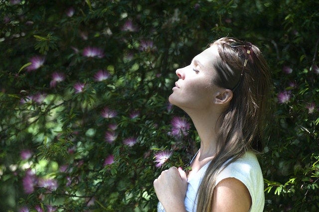 Person meditating during breathwork