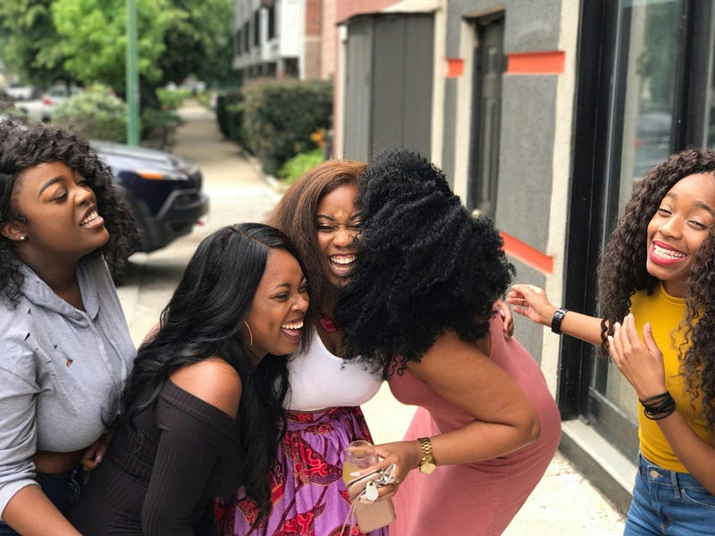 Women sharing a moment of joy and laughter